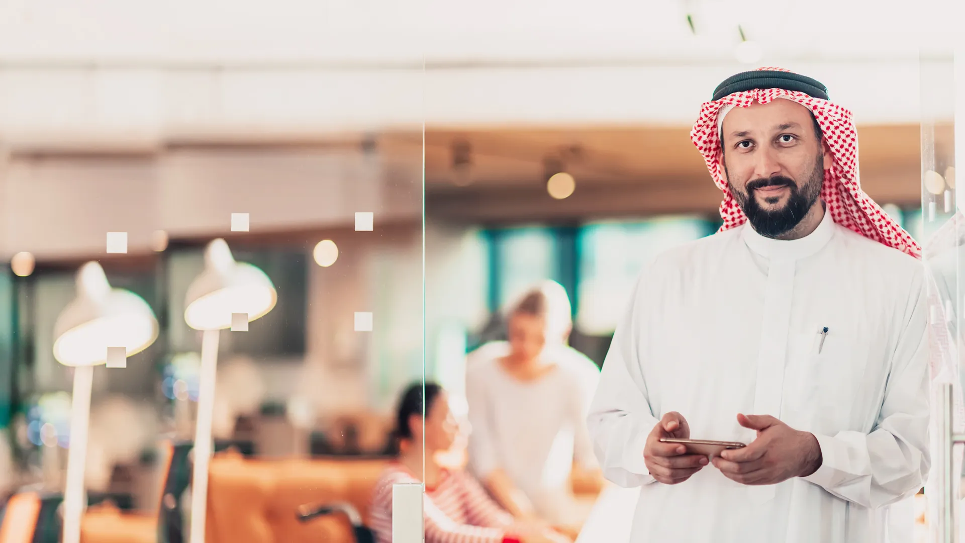 Visitor checking in with a QR-based digital pass in the UAE